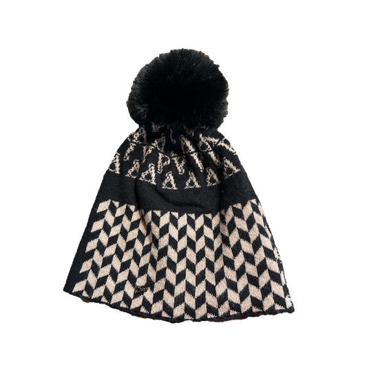 Cappello in maglia con pom pon fantasia geometrica