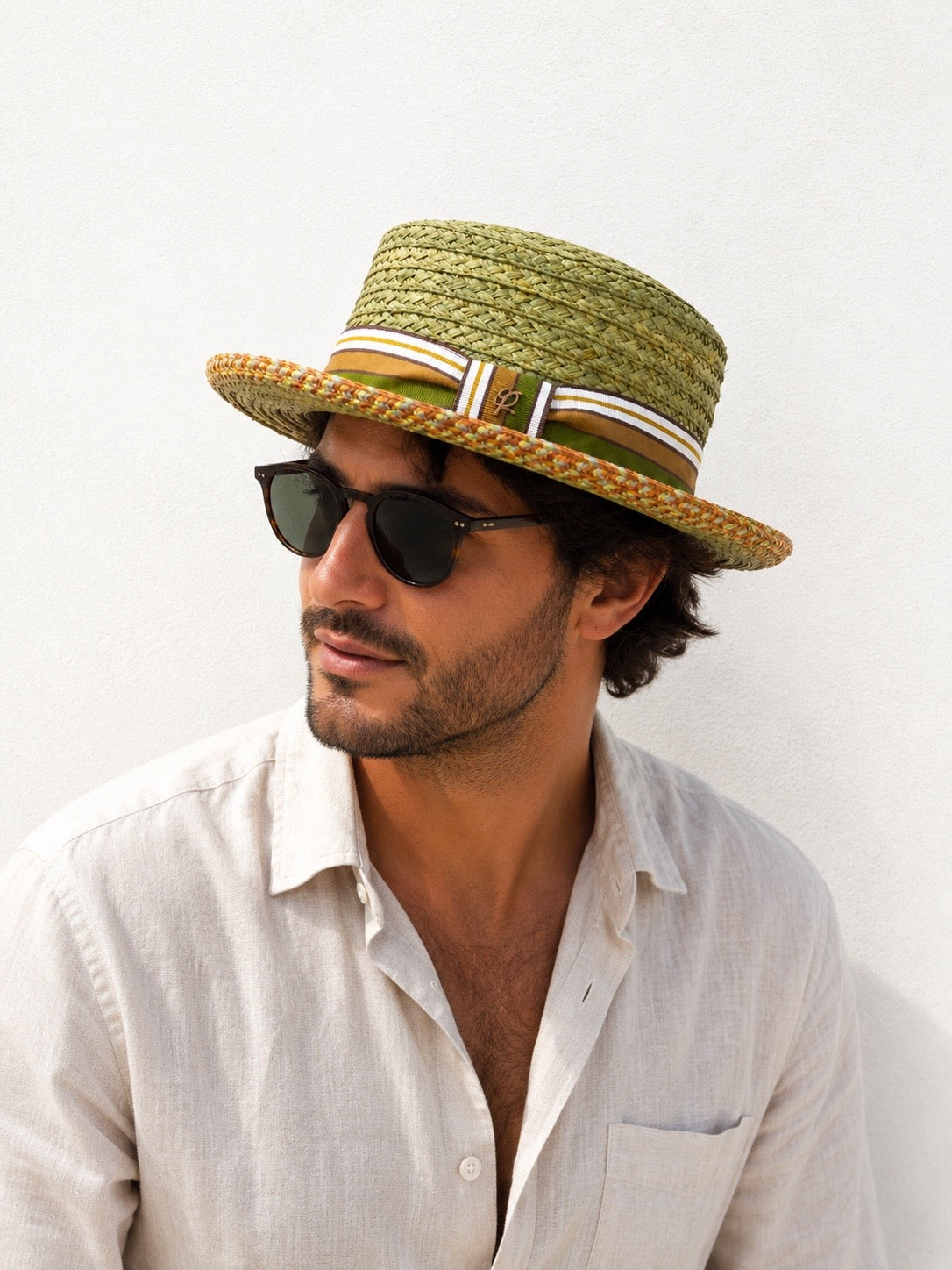 Cappello Pork Pie in paglia intrecciata verde con fascia decorativa
