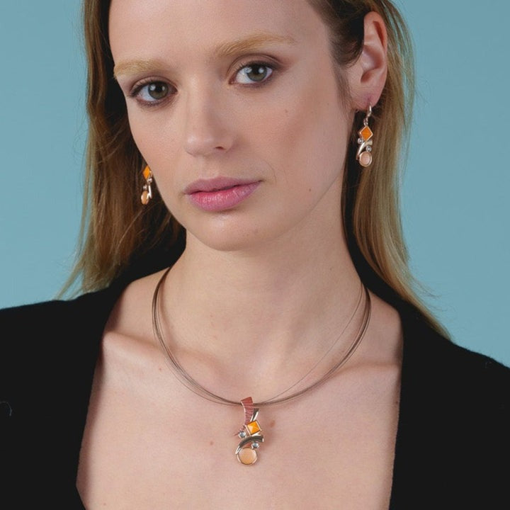 Collana virgole arancione